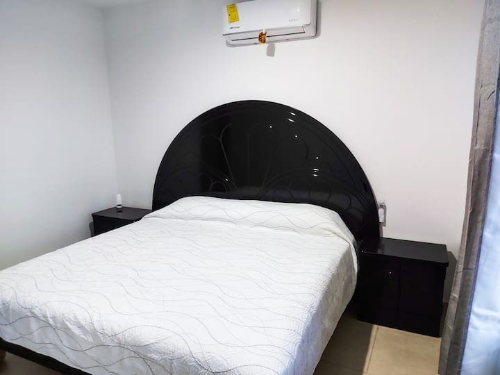 Bedroom 2 with its private full bathroom and A/C