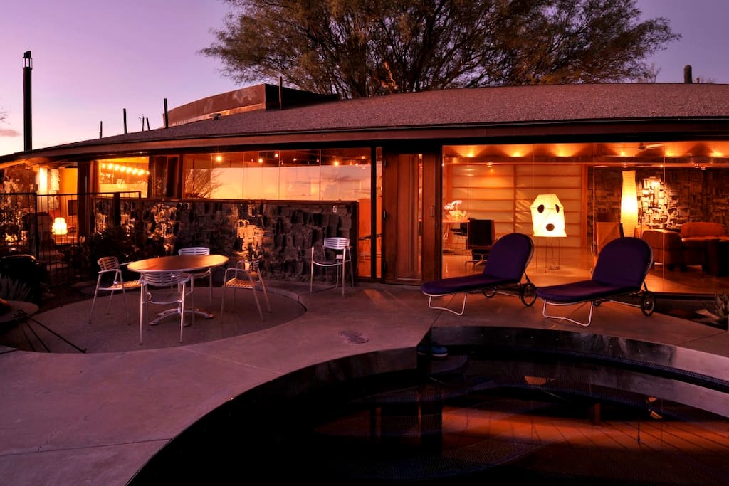 the natural light of sundown combined with the glow of the interior lights