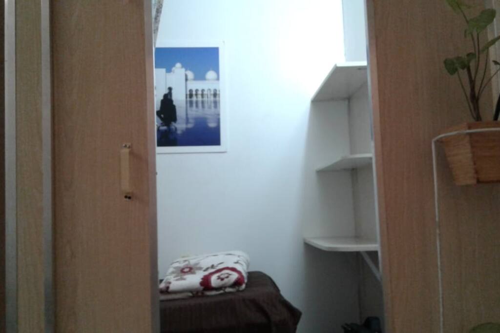 Solo room with comfortable bed spacious storage