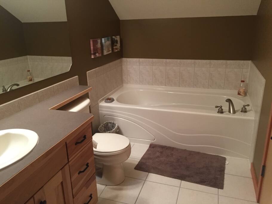 Ensuite bathroom; main bedroom. Large bath and separate shower.