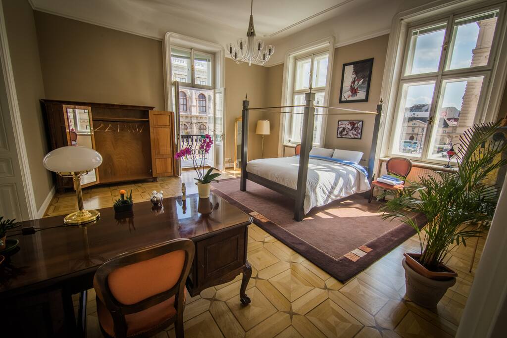 You will have space to work on the desk and for all your clothes in this antique wardrobe