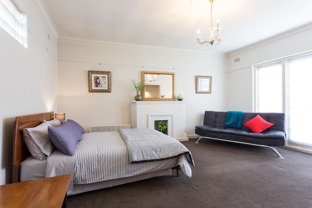 Large, bed/living area, couch