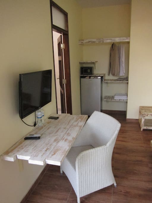 Safety box, Refrigerator and Flat LED TV with cable TV channels in the room