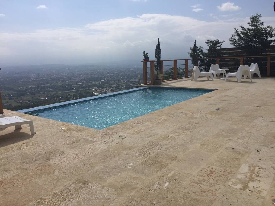 Pool with city view and hot water