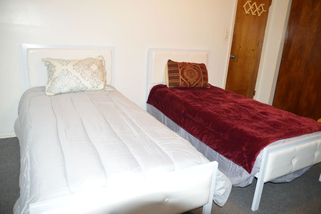 Two very comfy single beds