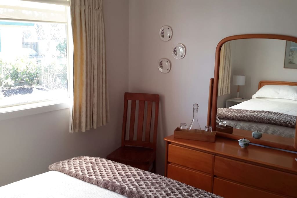 A good size mirror and dressing table