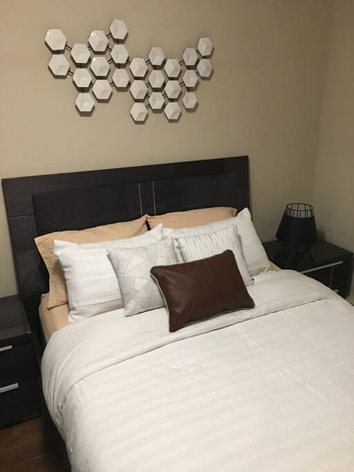 Queen bed accommodates two comfortably
