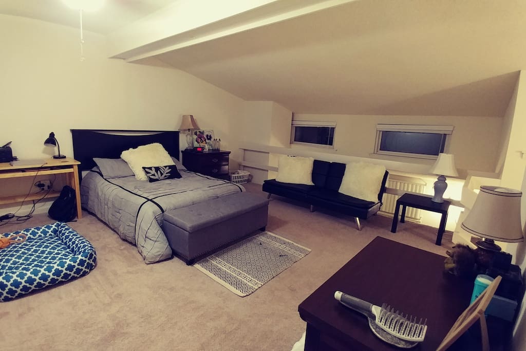 spacious lofted bedroom includes a full-sized bed and a memory-foam futon that folds out into a double bed.
