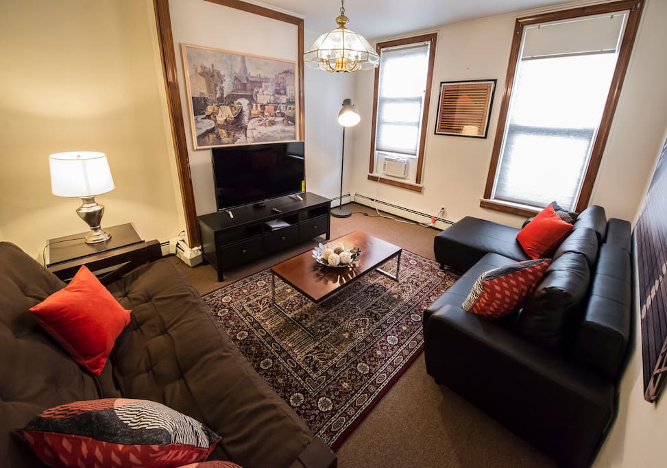 Living Room With 50" Smart TV, 2 Sleeper Sofa