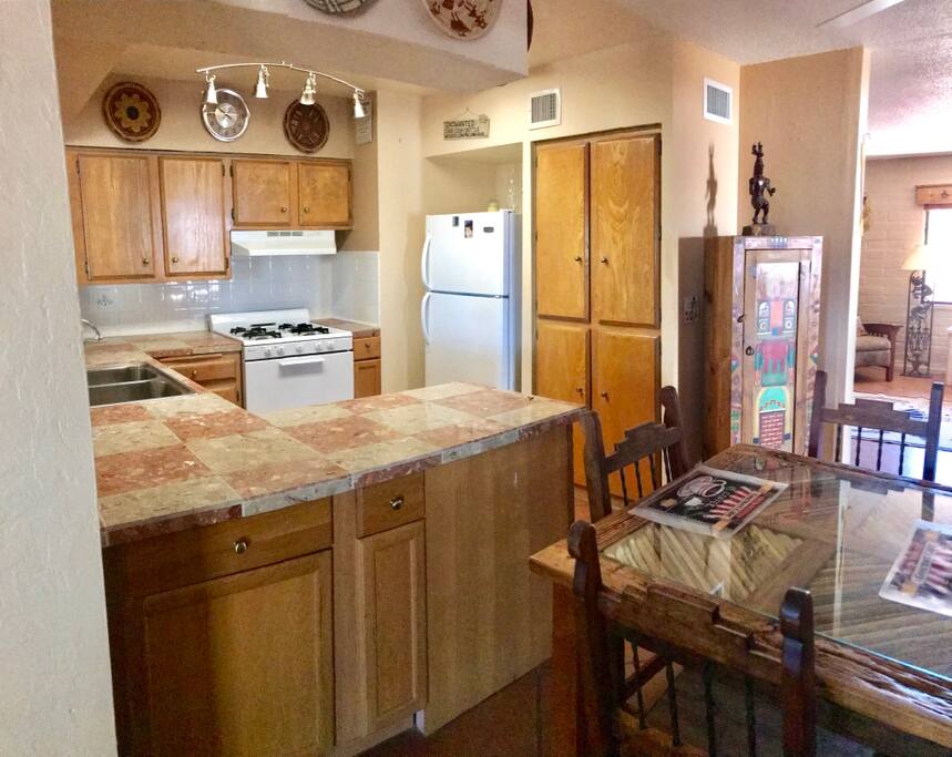 Kitchen with all amenities, including microwave, coffee machine and coffee, tea kettle and assorted teas
