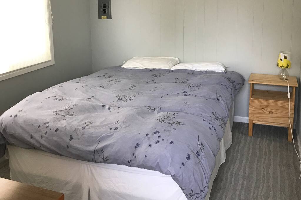 Bedroom with queen bed.