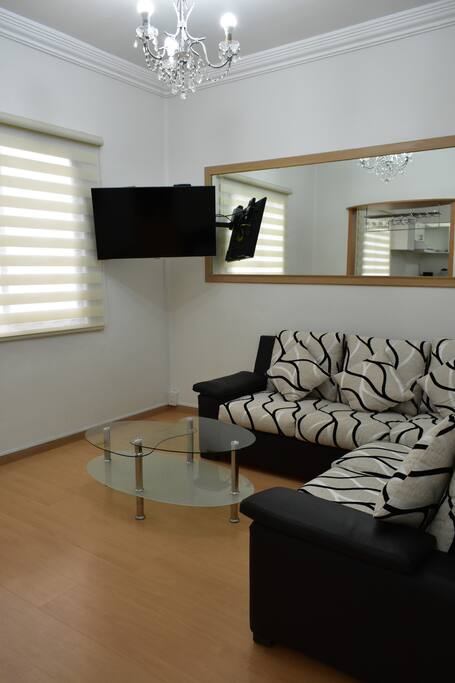 Living room with flat screen, Netflix and cable TV