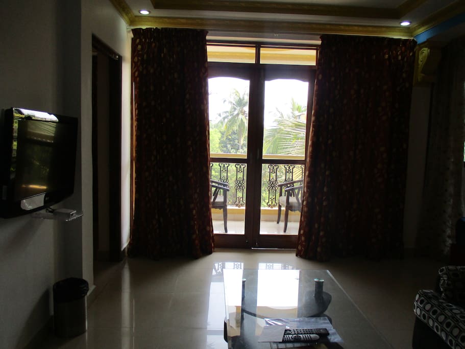 Deluxe Suite - Seating Area & Balcony