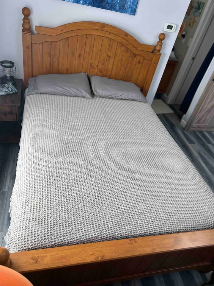 Queen size bed with 2 pillowtop mattress pads