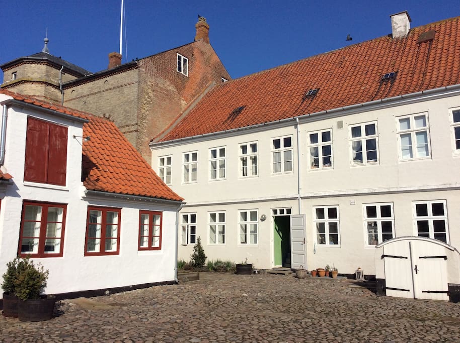 the Old Wash House and main house from courtyard