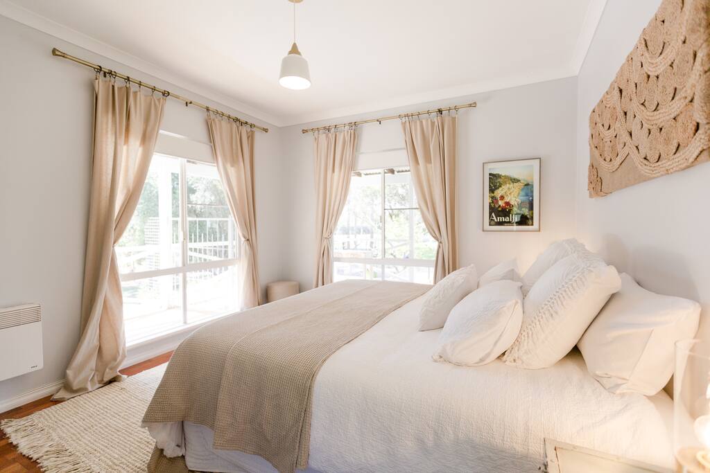 king size bed with garden views