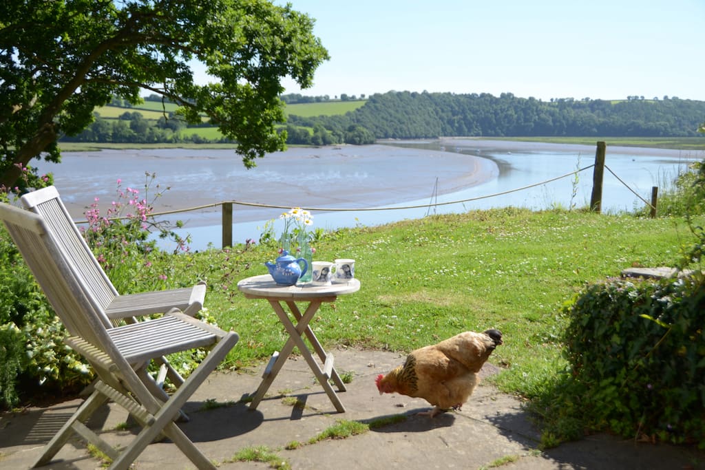A sunny, secluded terrace to relax on with wonderful views of the river.