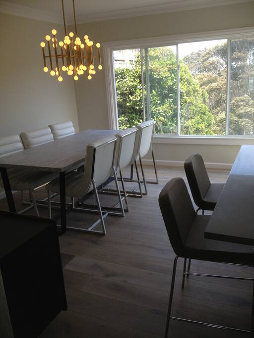 Open concept kitchen and dining room with eat in bar