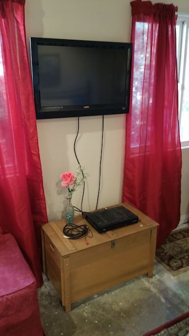 TV with cable and super-fast WIFI. Cables on that trunk for plugging into the TV from your laptop if you want.