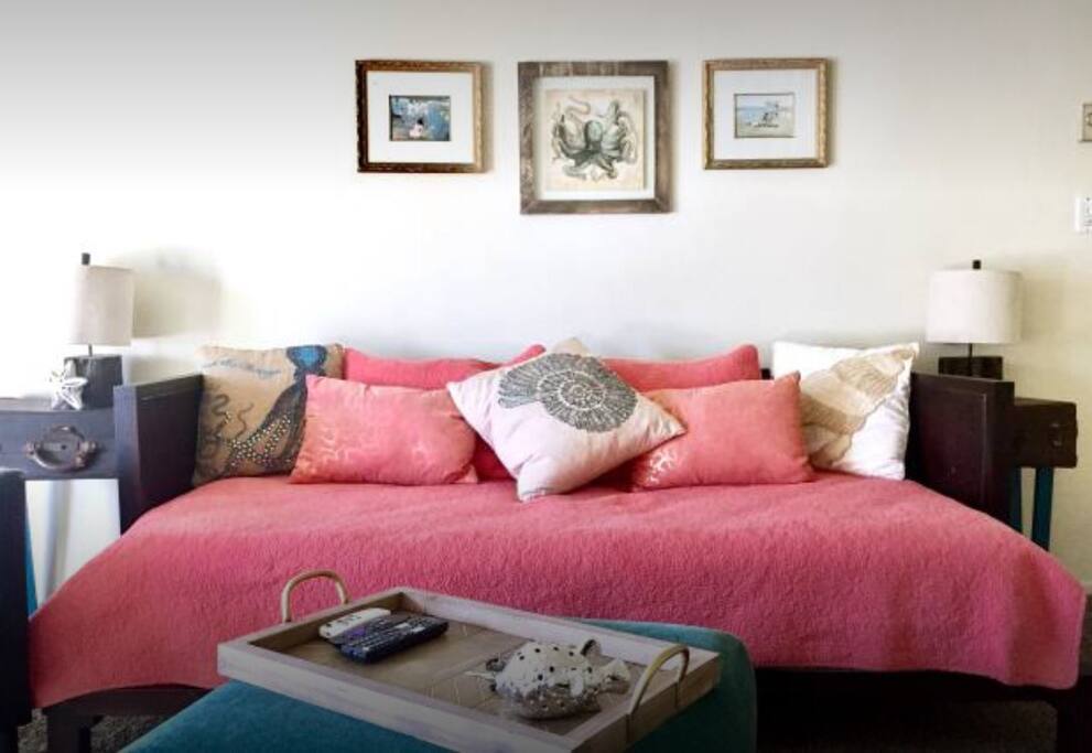 Large living room area. Area has been updated with brand new AC, larger desk in an additional leather club chair for seating two large drawers are empty for guest use. Average size patio with two seats if you feel like taking in some sunshine or some air.