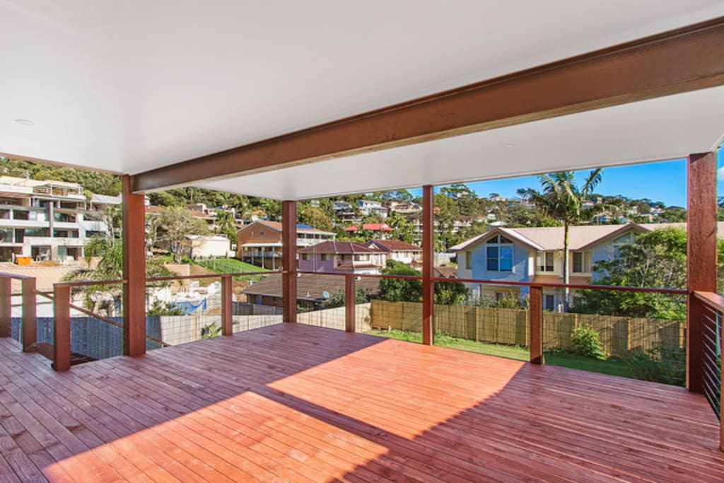Beautiful outside area with large outside dining table to enjoy the sunshine