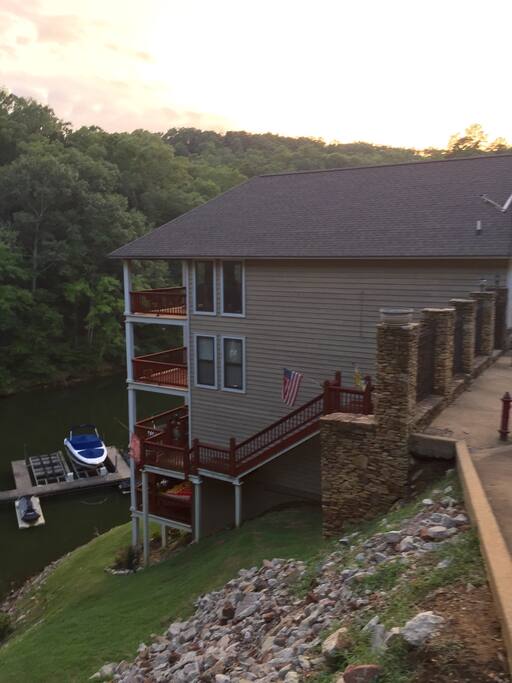 Side view with stairwell to the dock and lower level