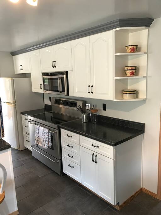 Brand new kitchen with stainless steel appliances