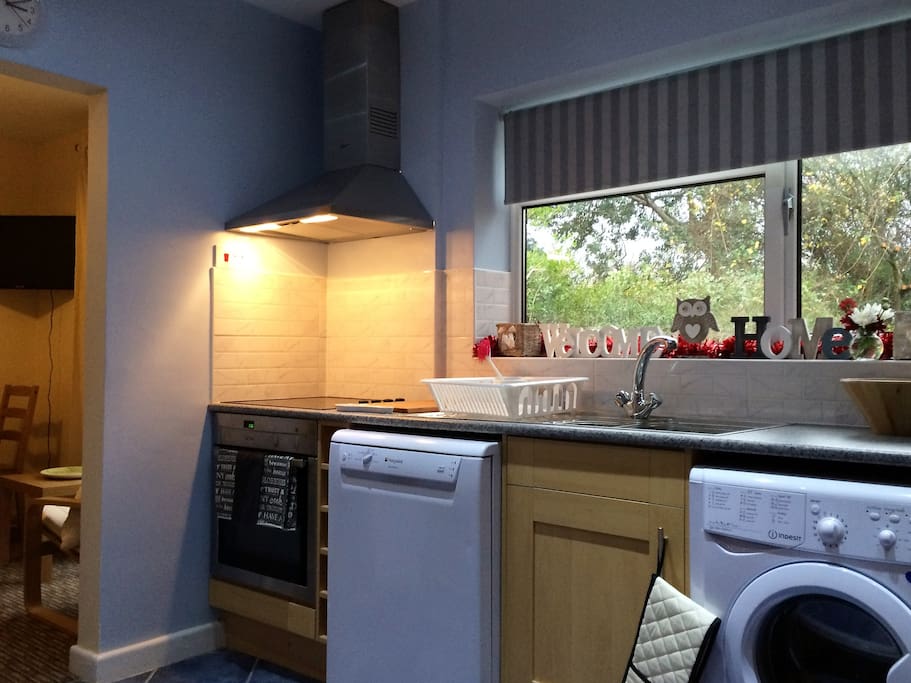 This is the Kitchen which is shared with other occupants who are very clean and tidy and will expect you to wash up after your own use as they will do the same.