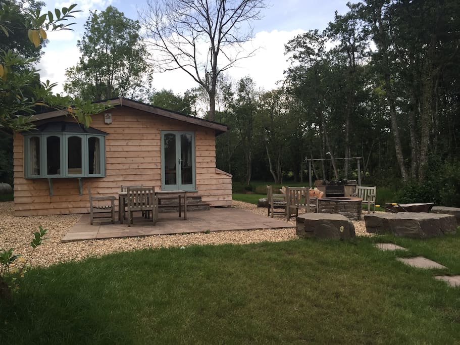 Lakeside with patio, fire pit and separate BBQ.