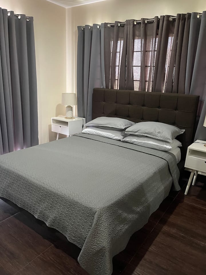 Master’s bedroom (queen-sized bed) with aircon