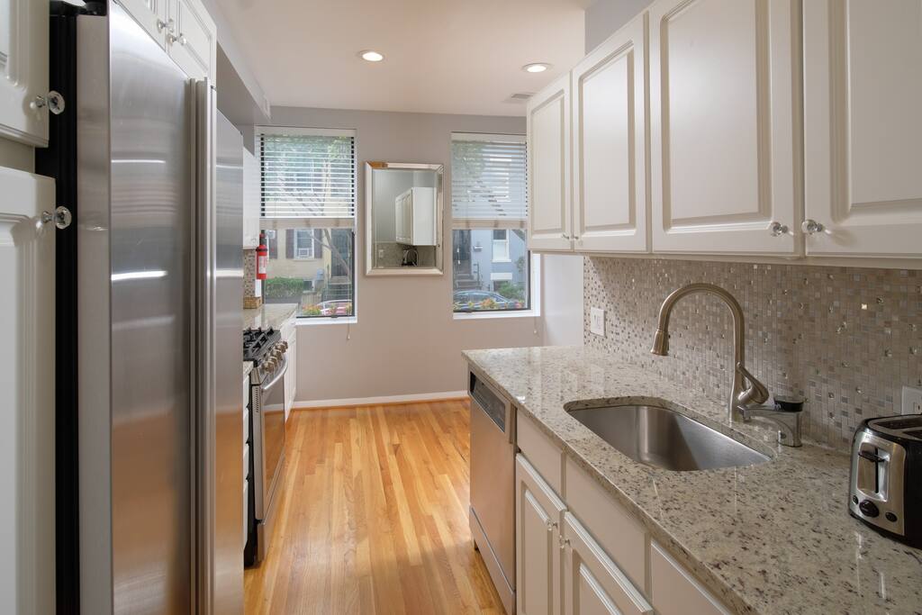 You won’t want to leave this attractive kitchen, which boasts only the most efficient stainless steel appliances.