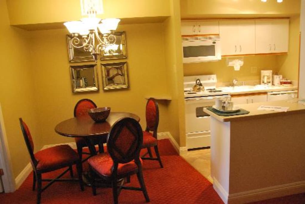 Full kitchen with stove/oven, microwave, dishwasher, fridge, all utensils and plateware, glassware, pots and pans, blender, etc.