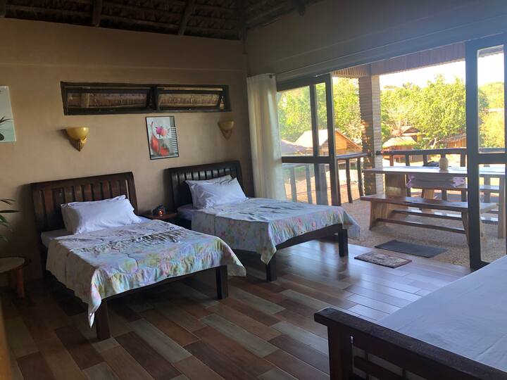 First floor, 2 single beds and sofa bed. 