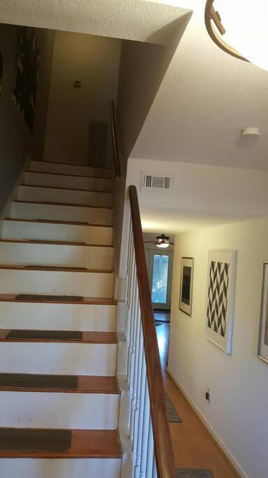 2-floor luxury townhouse with (2) full bathrooms in each room and half bathroom on the main floor.