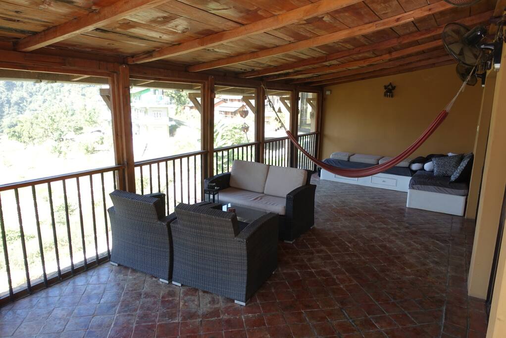 Heavenly screened-in porch area with beautiful views across Sarangot ridge and Phewa Tal lake