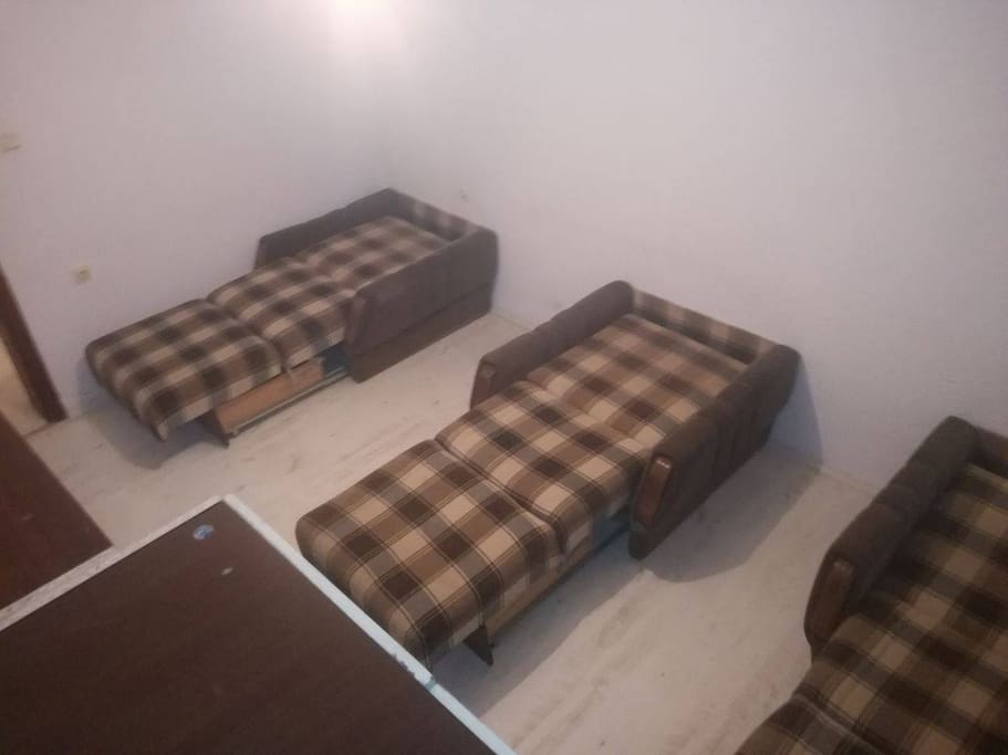 Room with 3 beds