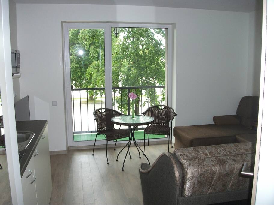 it is compact studio apartment, fitting all you need for comfortable holiday. The table with chairs easily portable to the balcony