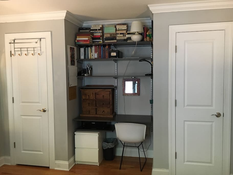 Desk and shelving in bedroom