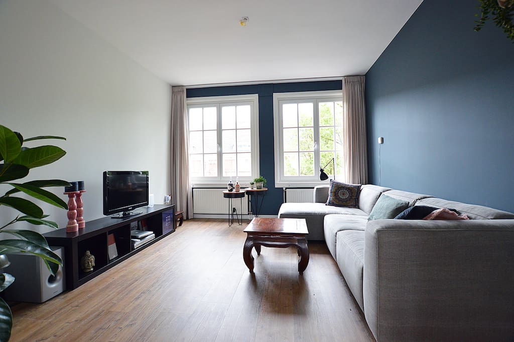 The lovely living room with very comfortable couch