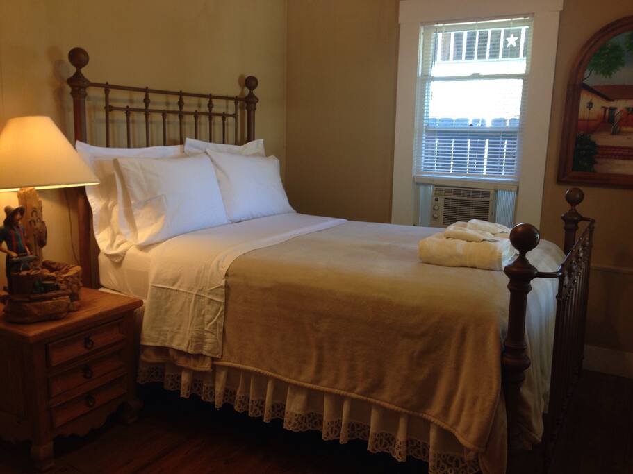 Brass antique bed with full size mattress.