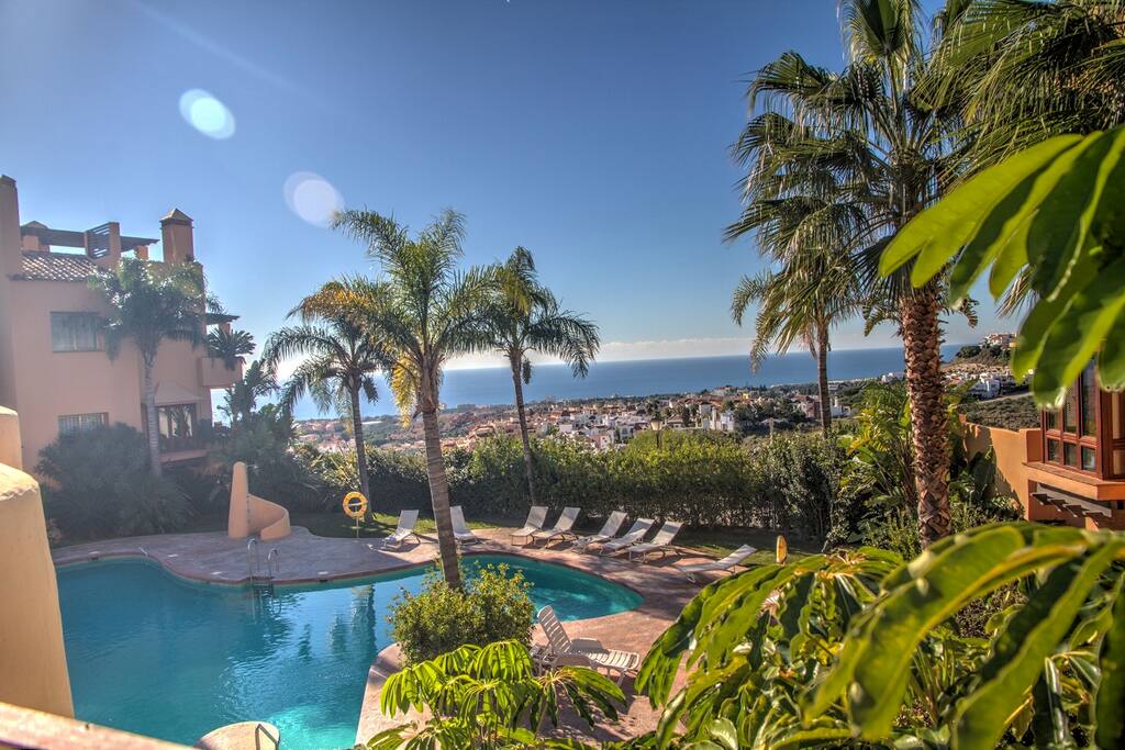 Great lagoon swimming pool with views, waterfall and pool house