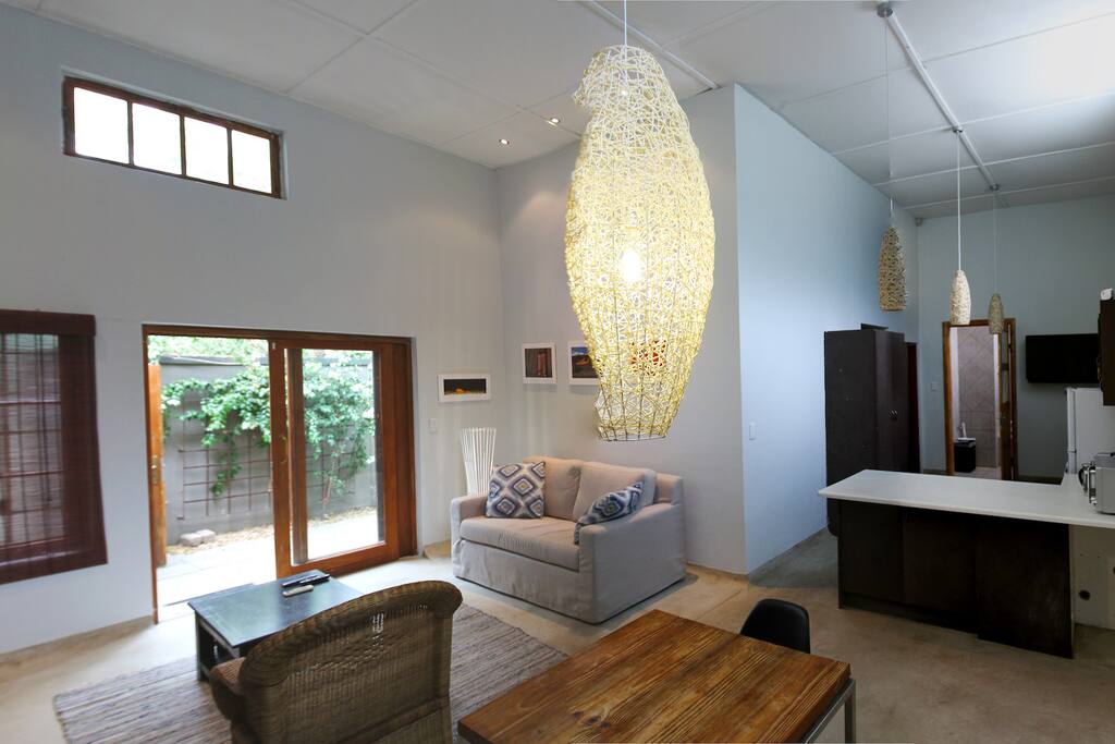 Open plan lounge, dining and kitchen.
