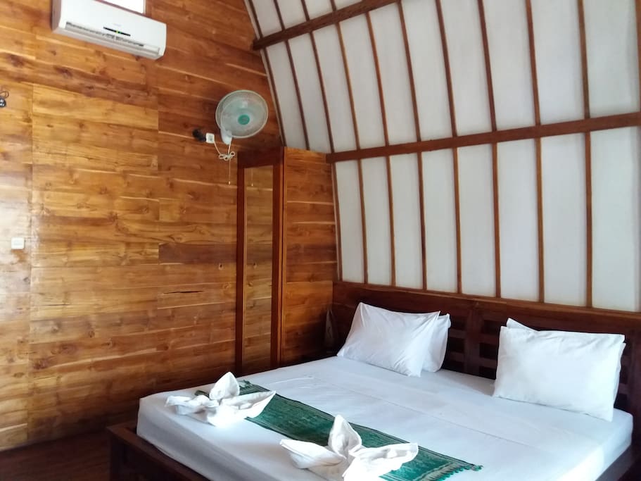 Inside Grand Deluxe Family Bungalow King Size Bed