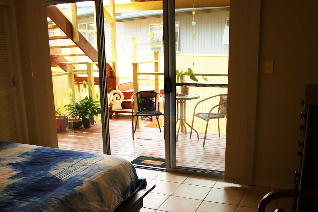 Downstairs bedroom with private deck outside