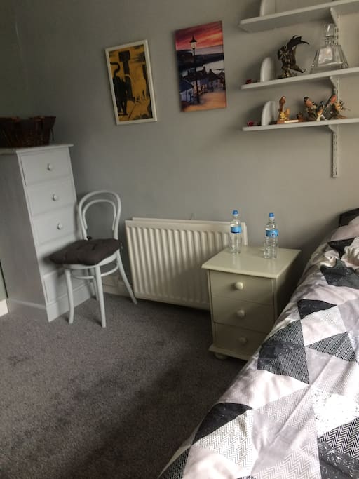 double bed, chest of drawers and bedside cabinet