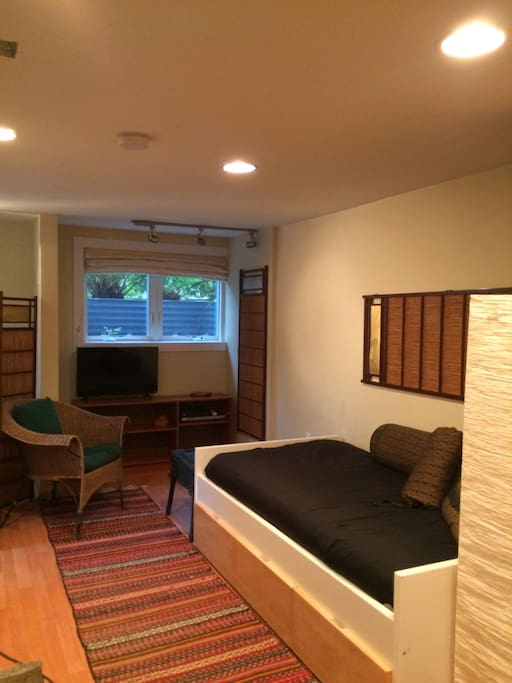 The living room/kitchen has 2 twin beds, one acts as a sofa and the other is in a little nook so you can have a bit of privacy...