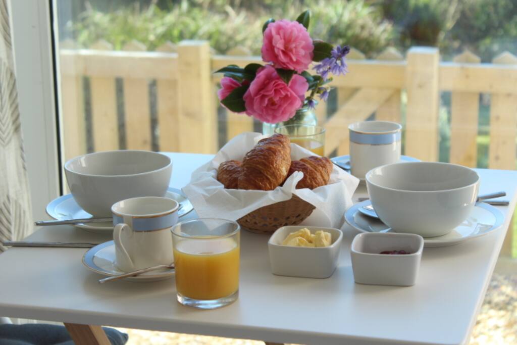 A light breakfast of orange juice, cereal , toast or croissants, tea /coffee brought to your room .