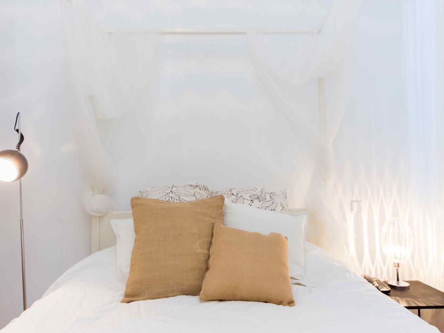 Bedroom with canopy bed