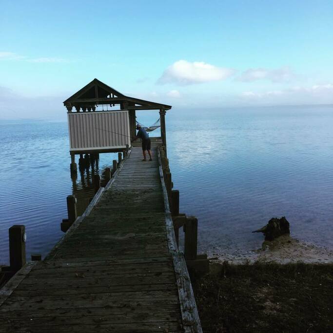 Private dock with hammock. Tie up your own boat to take inshore fishing!