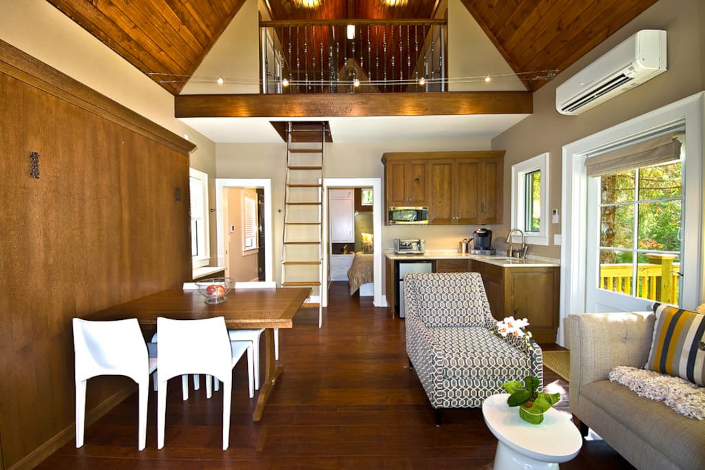 Spa-like interior with sitting area, breakfast table, kitchenette, loft